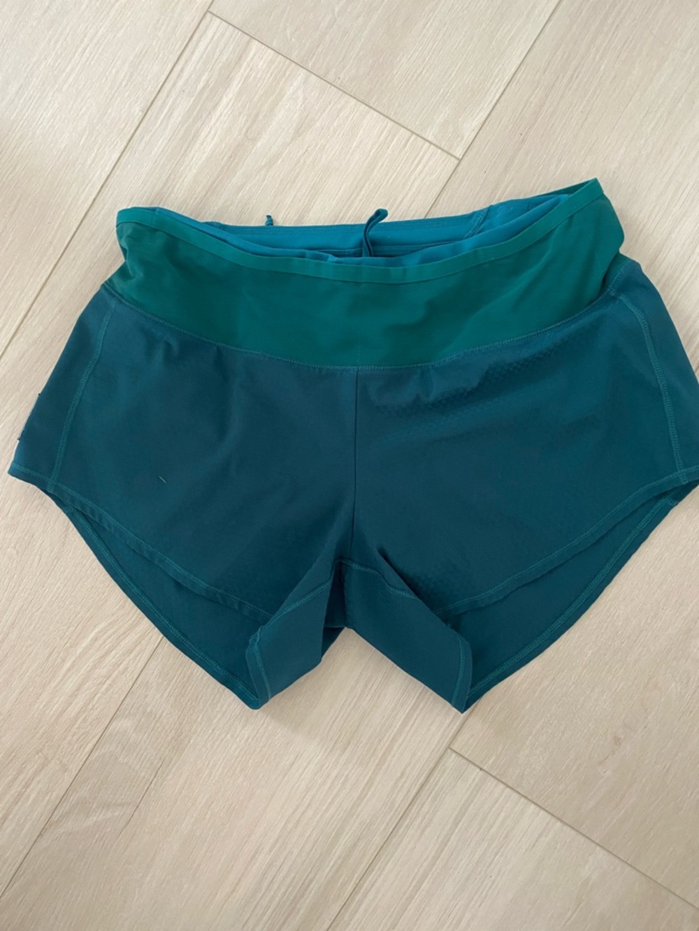 Women's Oiselle Roga Teal Running Shorts With Multiple Pockets